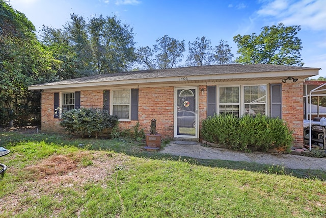 ranch-style house with a front yard