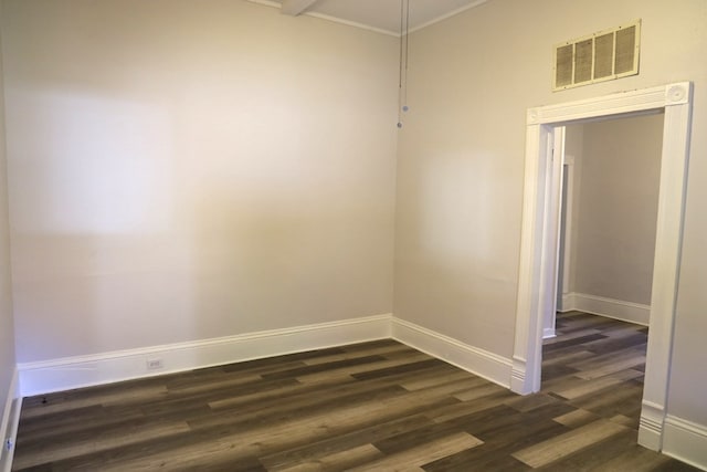 unfurnished room featuring dark hardwood / wood-style flooring