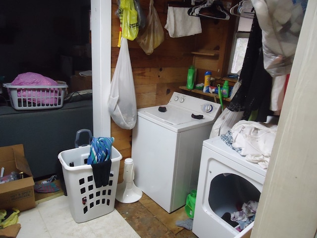 washroom featuring washer and clothes dryer