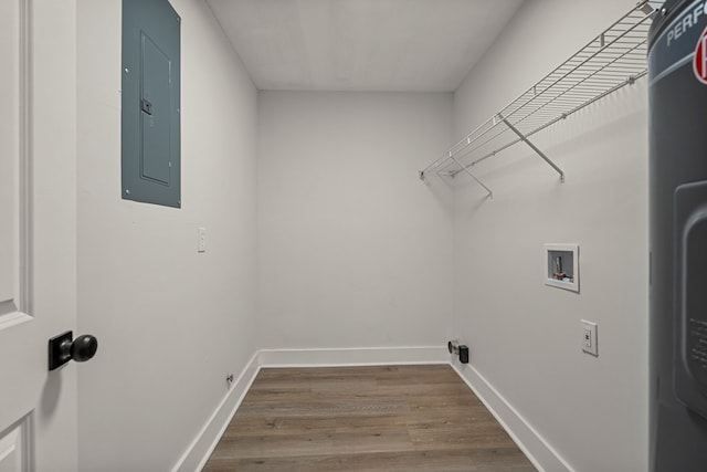919 54th St, Columbus, GA 31904 - washroom with electric panel, hookup for a washing machine, and wood finished floors