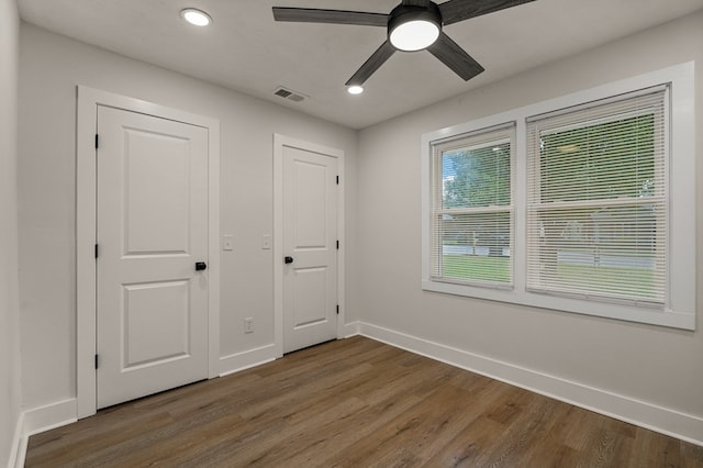 919 54th St, Columbus, GA 31904 - unfurnished bedroom with wood finished floors, recessed lighting, and a ceiling fan