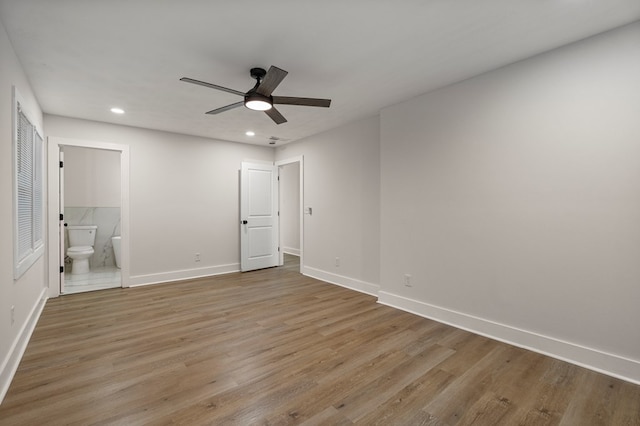 919 54th St, Columbus, GA 31904 - unfurnished bedroom featuring light wood-style flooring, recessed lighting, connected bathroom, and a ceiling fan