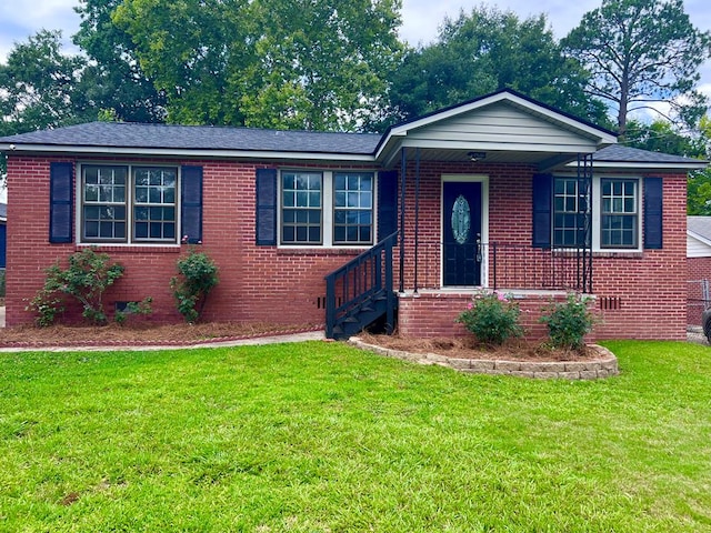 4517 Sherwood Ave, Columbus, GA 31904 - ranch-style house with brick siding, a front yard, and crawl space