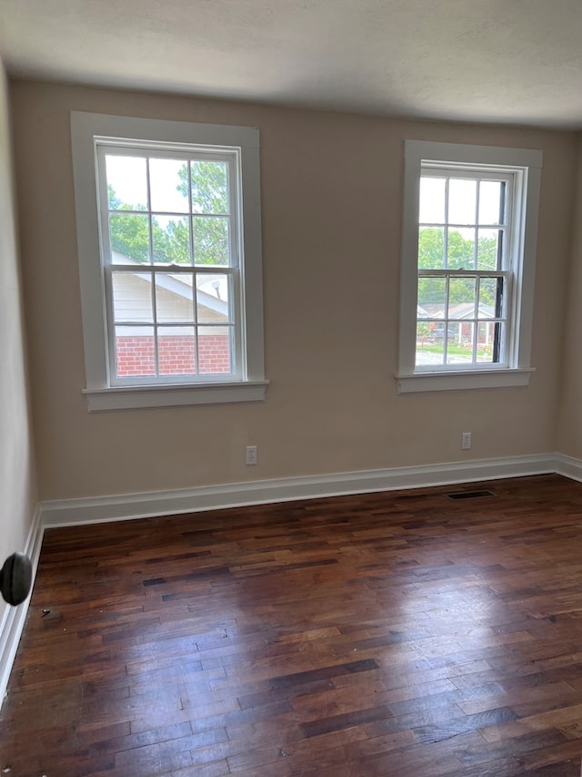 4517 Sherwood Ave, Columbus, GA 31904 - spare room with dark wood-style flooring and baseboards