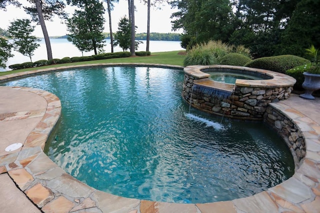 view of swimming pool with a water view and an in ground hot tub