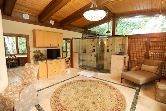 tiled living room with lofted ceiling with beams, wooden ceiling, and a healthy amount of sunlight