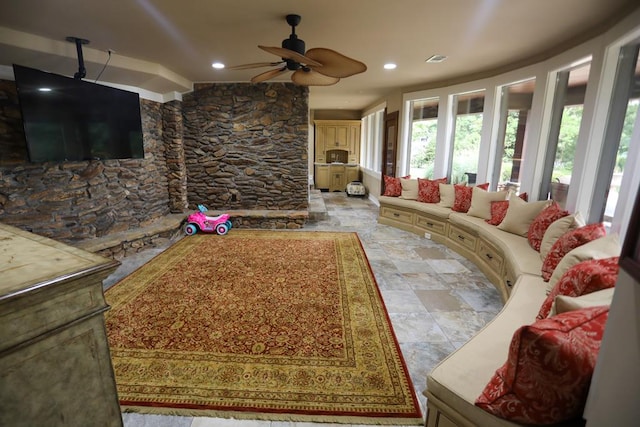 living room featuring ceiling fan