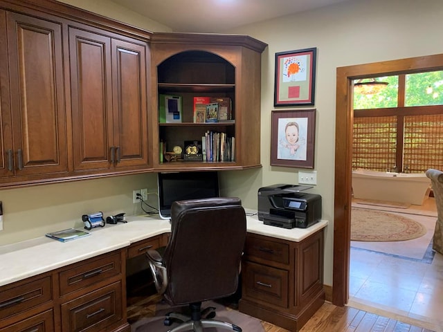 office area featuring built in desk