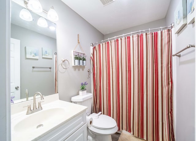 2 Alexander Loop, Phenix City, AL 36869 - full bath with toilet, vanity, and curtained shower