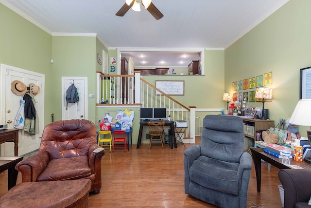 1811 Park Dr, Columbus, GA 31906 - living area featuring ornamental molding, a ceiling fan, wood finished floors, and stairs