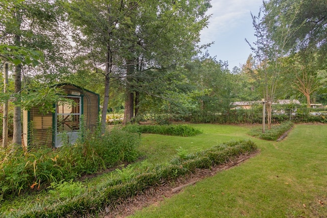 4833 Marino St, Columbus, GA 31907 - view of green lawn featuring an outbuilding