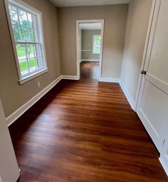 1555 Wells Dr, Columbus, GA 31906 - unfurnished room featuring baseboards and dark wood finished floors