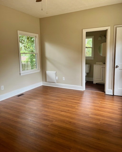 1555 Wells Dr, Columbus, GA 31906 - spare room with wood finished floors and a ceiling fan