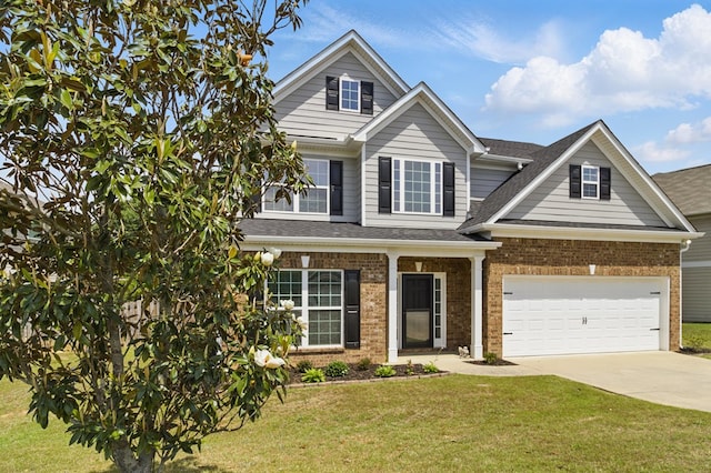 4685 Ivy Patch Dr, Fortson, GA 31808 - view of front of house with brick siding, concrete driveway, a front yard, a garage, and a shingled roof