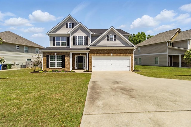 4685 Ivy Patch Dr, Fortson, GA 31808 - view of front of house featuring brick siding, driveway, and a front lawn