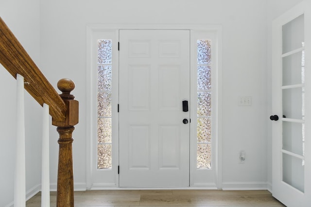 4685 Ivy Patch Dr, Fortson, GA 31808 - entrance foyer with light wood-style floors, baseboards, and plenty of natural light