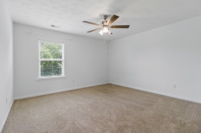 4685 Ivy Patch Dr, Fortson, GA 31808 - carpeted empty room with ceiling fan, baseboards, and a textured ceiling