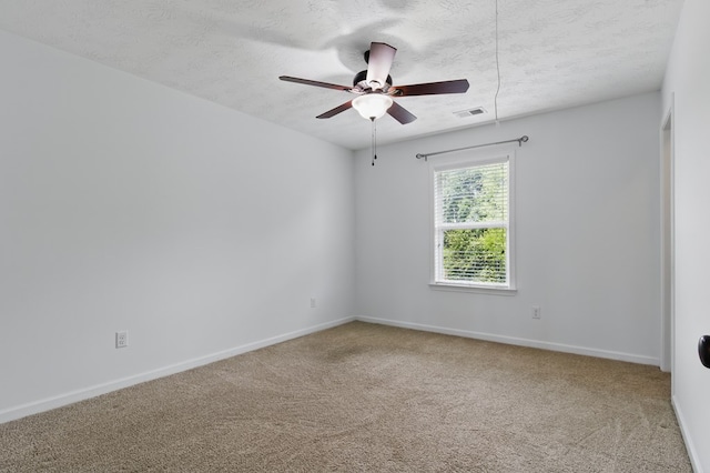 4685 Ivy Patch Dr, Fortson, GA 31808 - carpeted spare room featuring ceiling fan, a textured ceiling, and baseboards