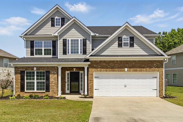 4685 Ivy Patch Dr, Fortson, GA 31808 - craftsman-style house with brick siding, driveway, and a front lawn