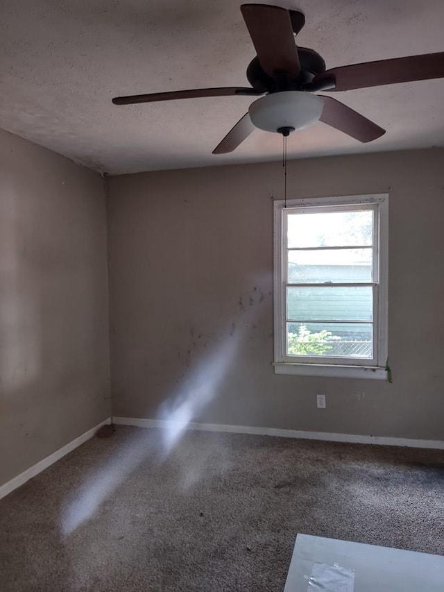 empty room featuring a textured ceiling