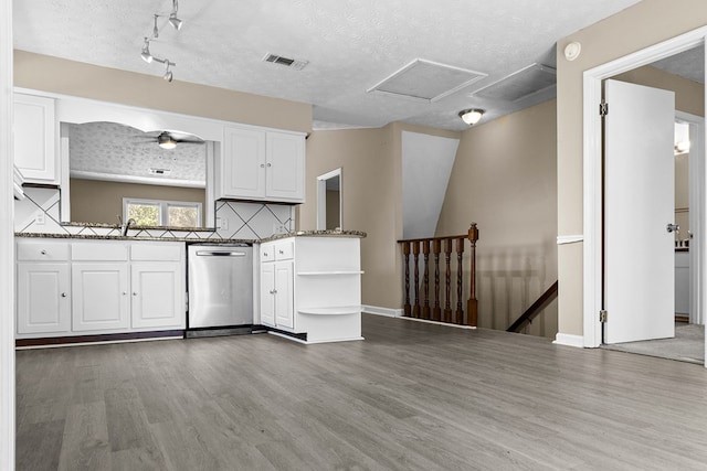 kitchen featuring dark wood-style floors, visible vents, white cabinetry, dishwasher, and open shelves