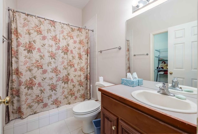 full bath featuring tile patterned floors, curtained shower, vanity, and toilet