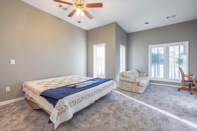 bedroom featuring visible vents, baseboards, carpet, and ceiling fan