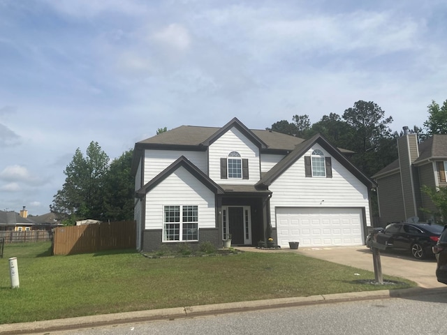 5TRAFFORDTRL Trafford Trl, Phenix City, AL 36870 - traditional-style home featuring an attached garage, a front lawn, fence, and driveway