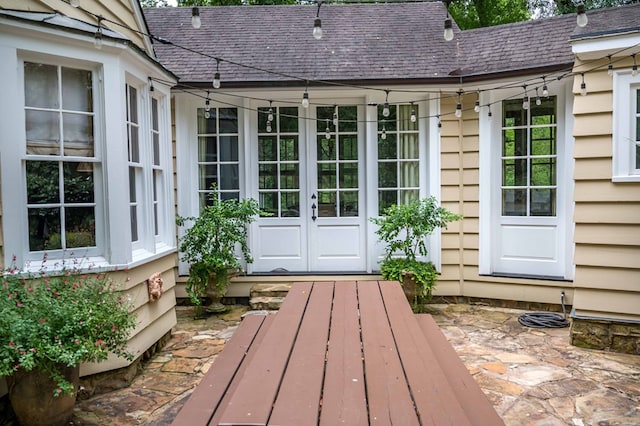 view of outbuilding featuring french doors