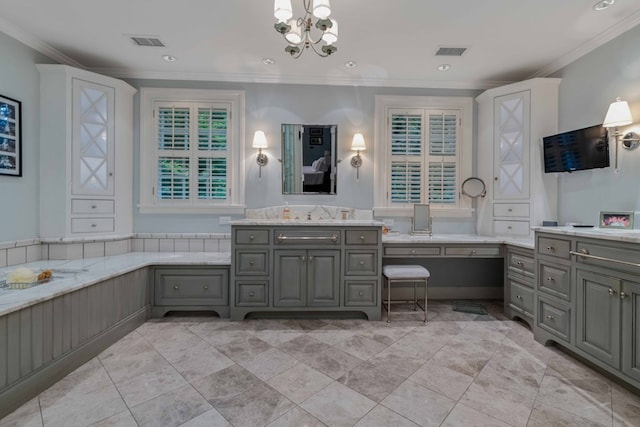 bathroom featuring visible vents, crown molding, and vanity