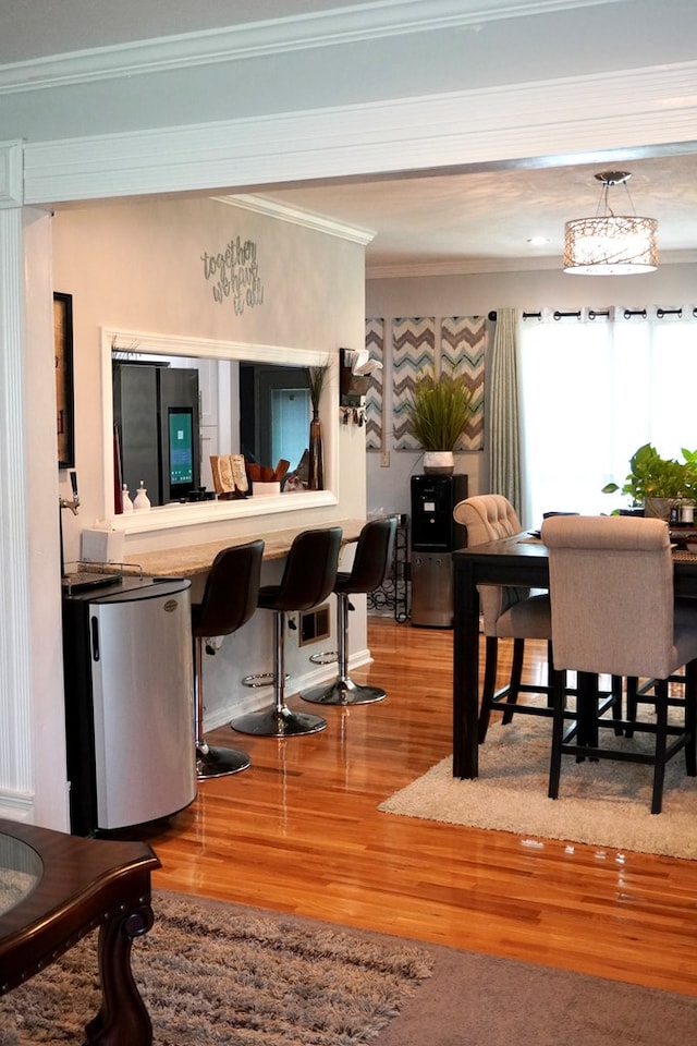 404 19th Ave, Phenix City, AL 36869 - dining area with wood finished floors and crown molding