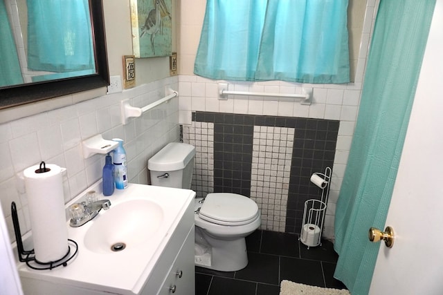 404 19th Ave, Phenix City, AL 36869 - bathroom with tile walls, vanity, tile patterned flooring, and curtained shower