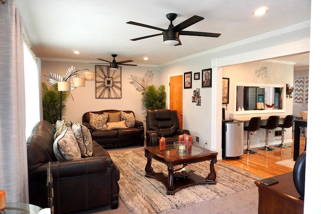 404 19th Ave, Phenix City, AL 36869 - living area featuring wood finished floors, ceiling fan, recessed lighting, and crown molding