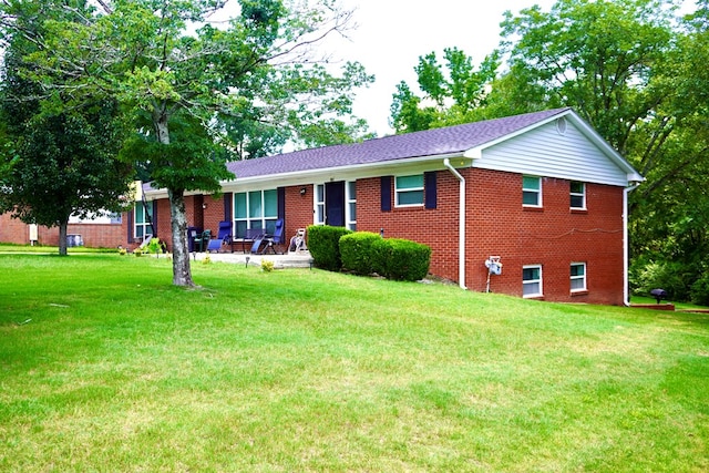 404 19th Ave, Phenix City, AL 36869 - single story home with brick siding and a front lawn