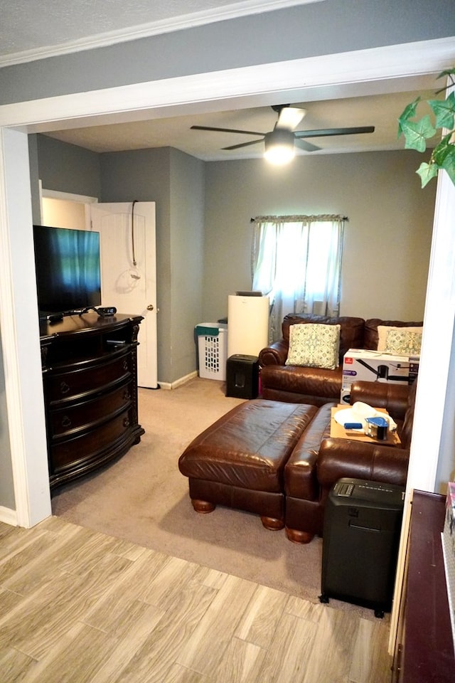 404 19th Ave, Phenix City, AL 36869 - living area with a ceiling fan, crown molding, and light wood-style flooring