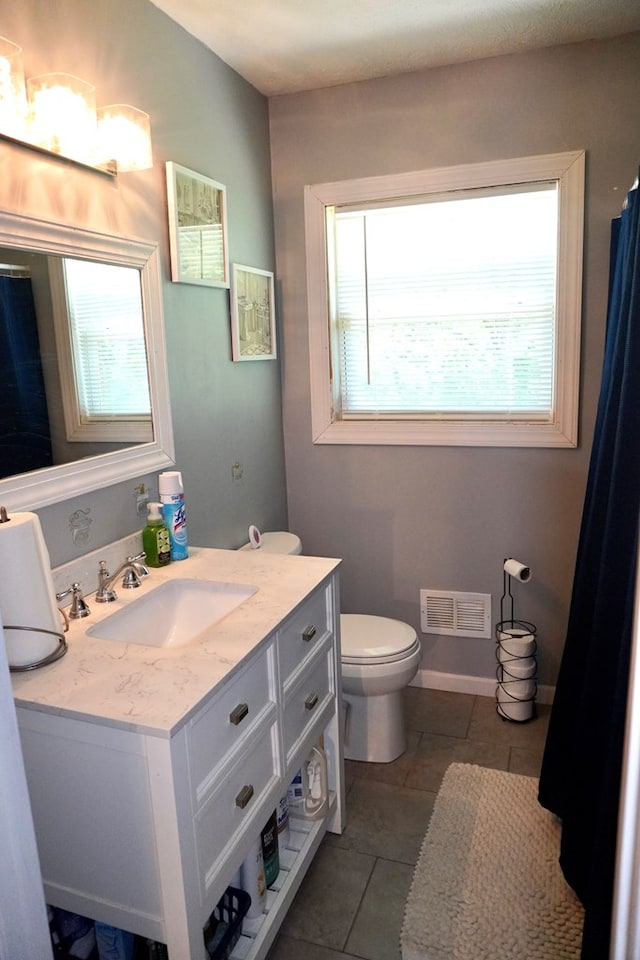 404 19th Ave, Phenix City, AL 36869 - bathroom with tile patterned floors and vanity
