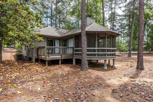 2387 Cedar Ln, Pine Mountain, GA 31822 - back of property featuring a shingled roof, a chimney, a sunroom, and a deck
