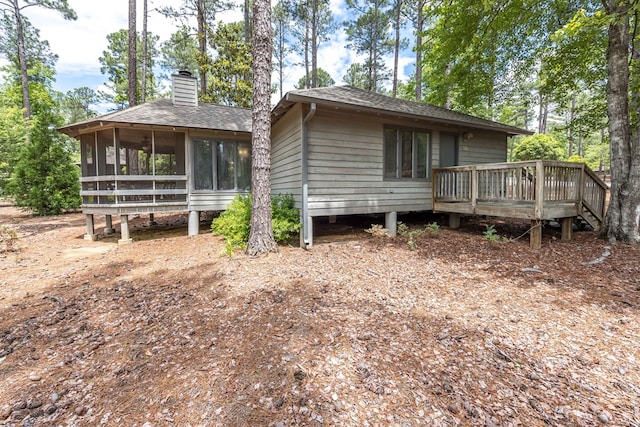 2387 Cedar Ln, Pine Mountain, GA 31822 - rear view of house with roof with shingles, a sunroom, a wooden deck, and a chimney