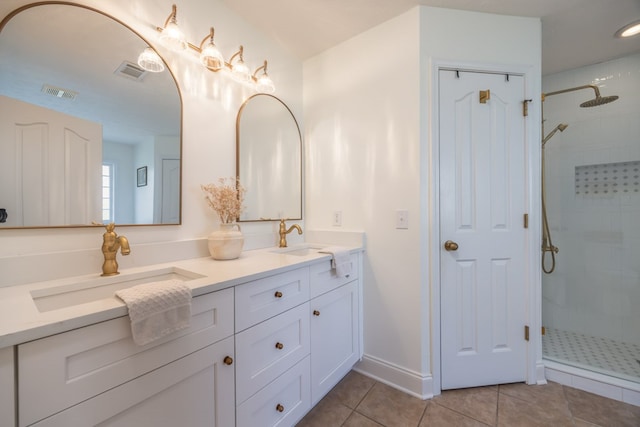 3022 Thornberry Cir, Phenix City, AL 36867 - bathroom featuring an enclosed shower, double vanity, and tile patterned floors
