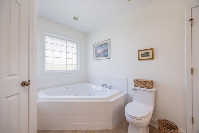 3022 Thornberry Cir, Phenix City, AL 36867 - bathroom with a whirlpool tub and toilet