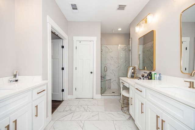 bathroom featuring vanity and a shower with door