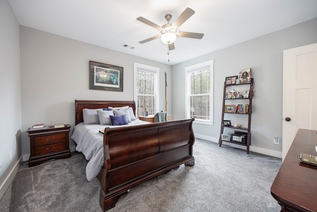 bedroom with dark carpet and ceiling fan