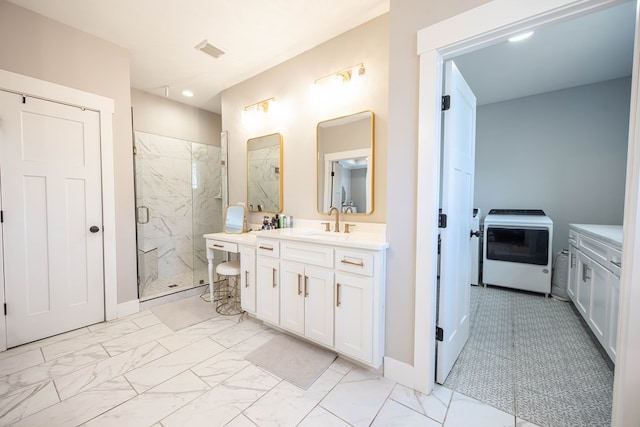 bathroom with vanity and a shower with shower door