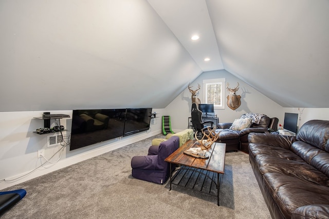 living room featuring lofted ceiling and carpet