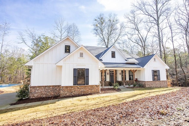 modern farmhouse style home with a porch