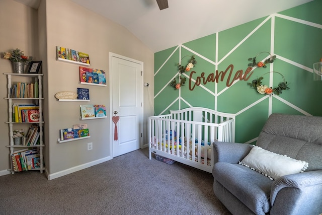 carpeted bedroom with vaulted ceiling and baseboards