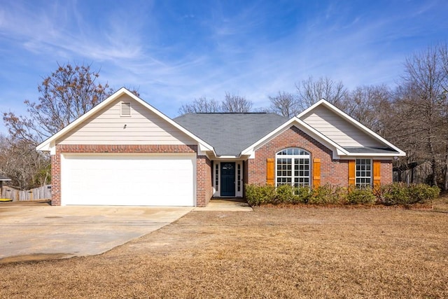 ranch-style home featuring a garage