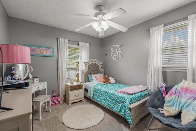 bedroom featuring carpet floors and ceiling fan