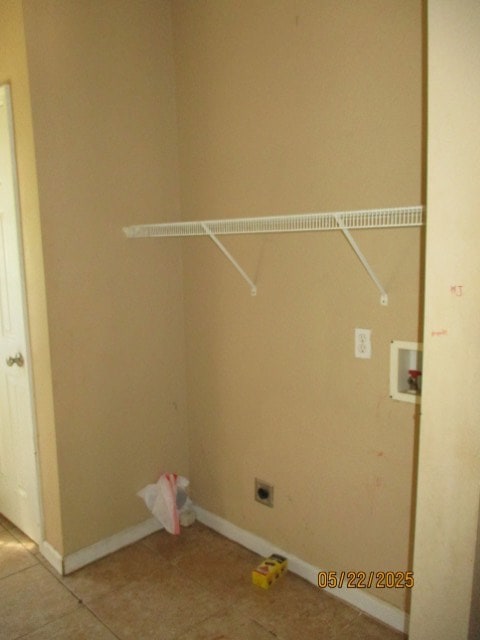 1902 6th Ct, Phenix City, AL 36867 - washroom with electric dryer hookup, light tile patterned floors, and washer hookup