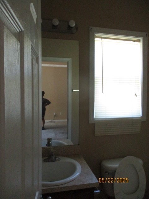 1902 6th Ct, Phenix City, AL 36867 - bathroom with toilet and vanity